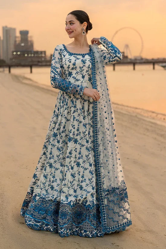 Hania Aamir wearing Jehona by Faiza Saqlain, a blue and white embroidered lawn pishwas with net dupatta lubaba luxury.