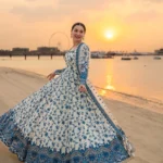 Hania Aamir wearing Jehona by Faiza Saqlain, a blue and white embroidered lawn pishwas with net dupatta lubaba luxury.