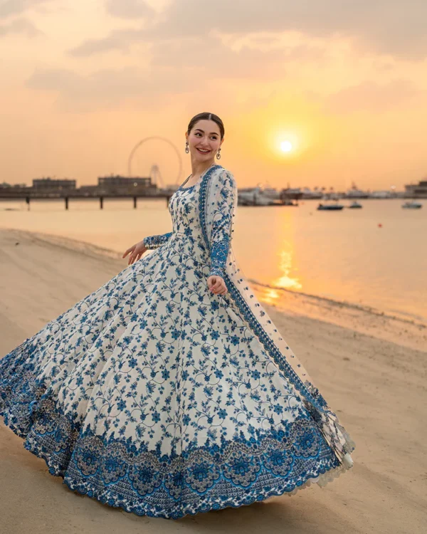 Hania Aamir wearing Jehona by Faiza Saqlain, a blue and white embroidered lawn pishwas with net dupatta lubaba luxury.
