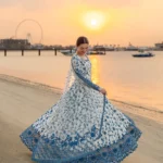 Hania Aamir wearing Jehona by Faiza Saqlain, a blue and white embroidered lawn pishwas with net dupatta lubaba luxury.