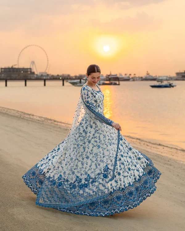 Hania Aamir wearing Jehona by Faiza Saqlain, a blue and white embroidered lawn pishwas with net dupatta lubaba luxury.
