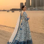 Hania Aamir wearing Jehona by Faiza Saqlain, a blue and white embroidered lawn pishwas with net dupatta lubaba luxury.