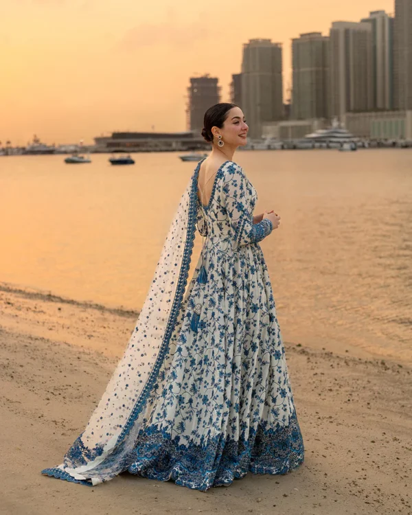 Hania Aamir wearing Jehona by Faiza Saqlain, a blue and white embroidered lawn pishwas with net dupatta lubaba luxury.