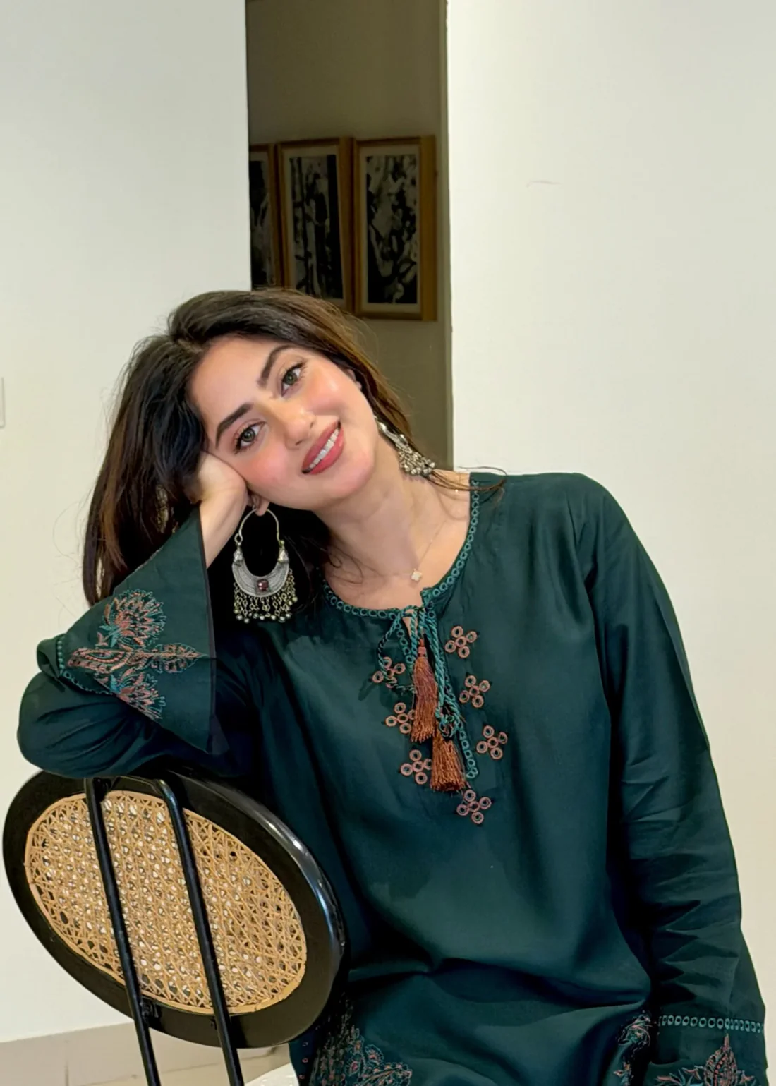 Pakistani actress Sajal Aly wearing a dark green embroidered 2-piece cotton suit with wide-leg trousers Lubaba Luxury.