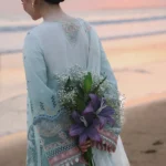 Qalamkar Sahil Luxury Lawn SA-05 Ayra light blue 3 piece unstitched suit with chikankari embroidery.