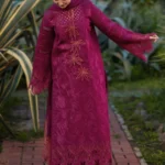 Model wearing Rang Rasiya Ayra unstitched luxury lawn 3-piece suit in plum with embroidered chikan shirt and khaddi net dupatta lubaba luxury.
