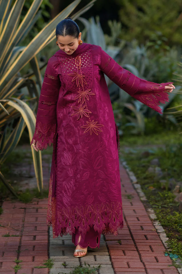Model wearing Rang Rasiya Ayra unstitched luxury lawn 3-piece suit in plum with embroidered chikan shirt and khaddi net dupatta lubaba luxury.