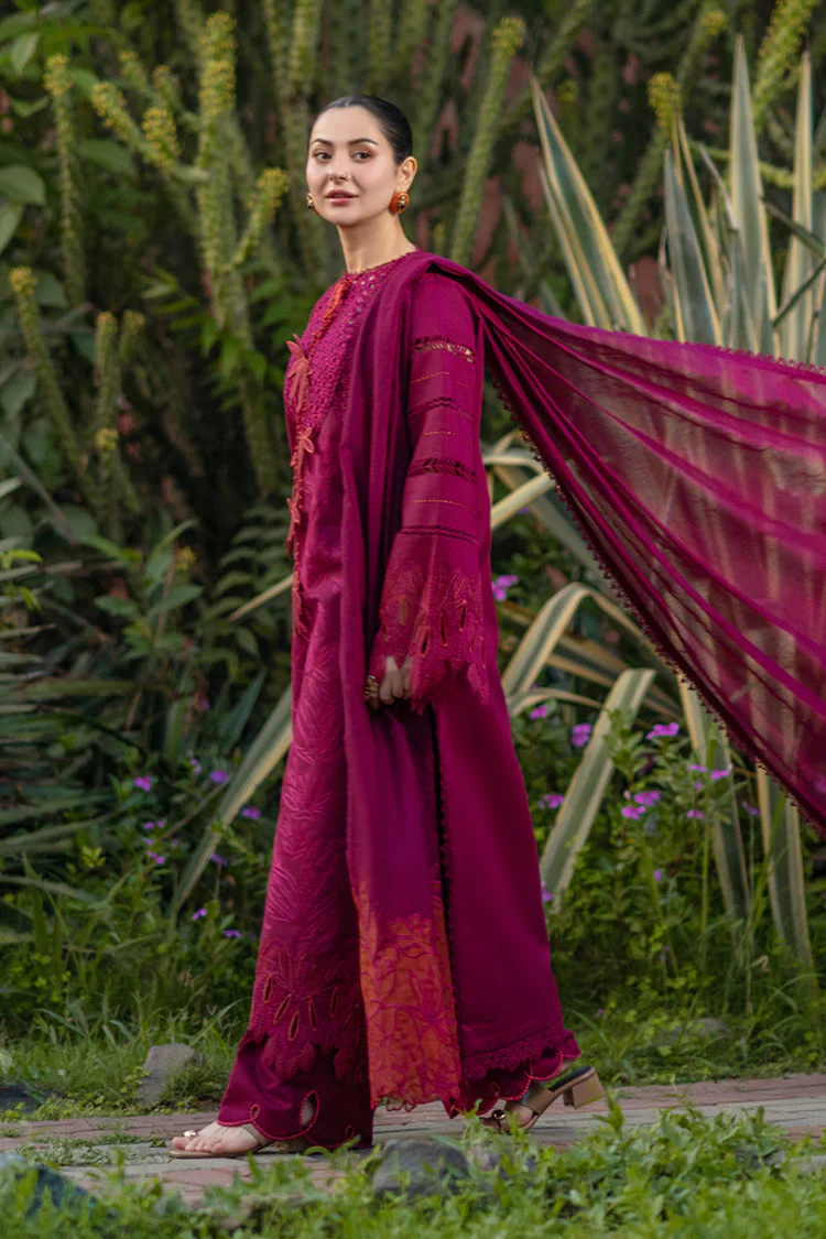 Model wearing Rang Rasiya Ayra unstitched luxury lawn 3-piece suit in plum with embroidered chikan shirt and khaddi net dupatta lubaba luxury.