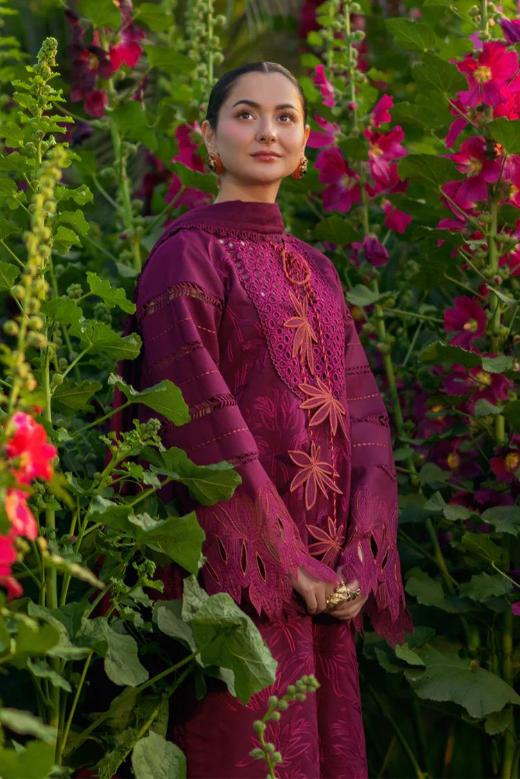 Model wearing Rang Rasiya Ayra unstitched luxury lawn 3-piece suit in plum with embroidered chikan shirt and khaddi net dupatta lubaba luxury.