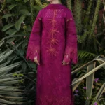 Model wearing Rang Rasiya Ayra unstitched luxury lawn 3-piece suit in plum with embroidered chikan shirt and khaddi net dupatta lubaba luxury.