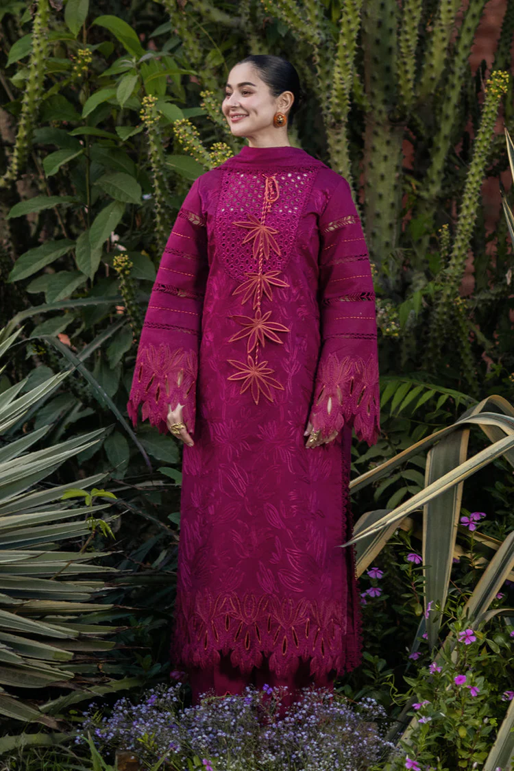 Model wearing Rang Rasiya Ayra unstitched luxury lawn 3-piece suit in plum with embroidered chikan shirt and khaddi net dupatta lubaba luxury.