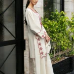 Ivory cotton Pakistani 3-piece suit with red bow embroidery and red dupatta by Lubaba Luxury.