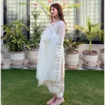 White 3-piece organza suit with intricate embroidery and a matching net dupatta by Lubaba Luxury.