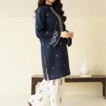 Close-up of Blue embroidered lawn shirt with white threadwork and matching trousers.