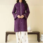 Close-up of Deep Plum embroidered lawn shirt with white threadwork and matching trousers.
