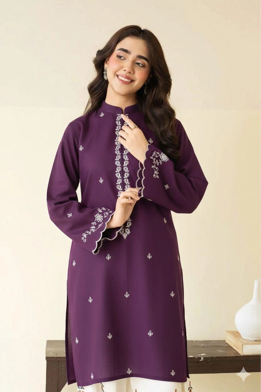Close-up of Deep Plum embroidered lawn shirt with white threadwork and matching trousers.